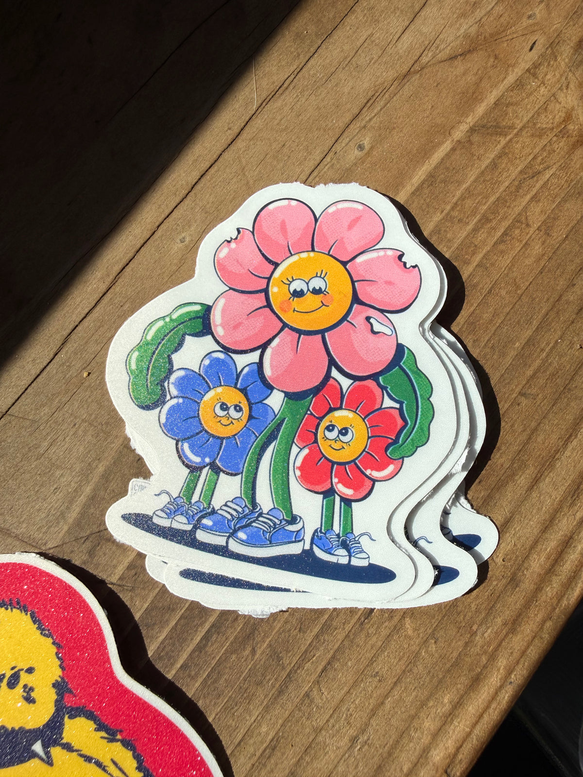 Flower Momma and her two babies, vinyl sticker 3”
